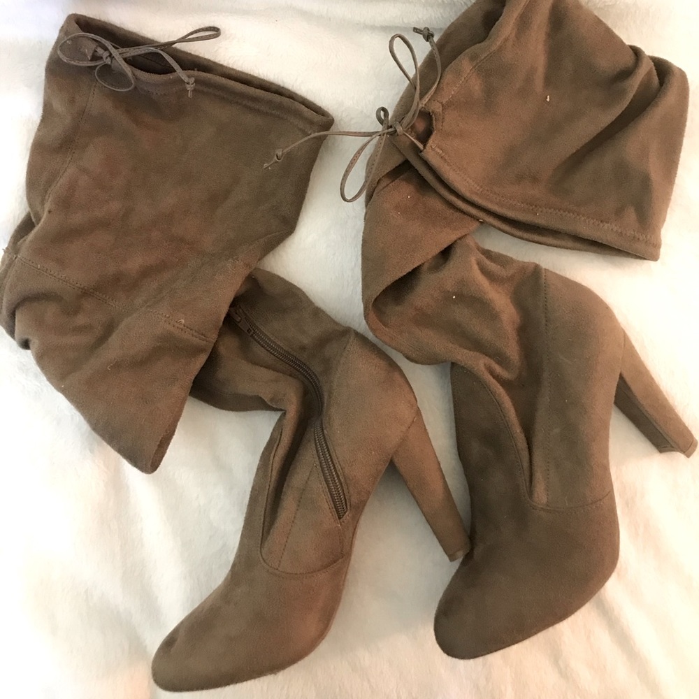 Thigh high heeled boots